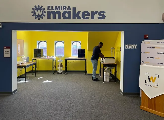 Image of the Elmira Makerspace. A yellow room with tools for entrepreneurs.